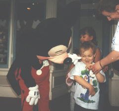 [picture of Bryan and Mickey Mouse]